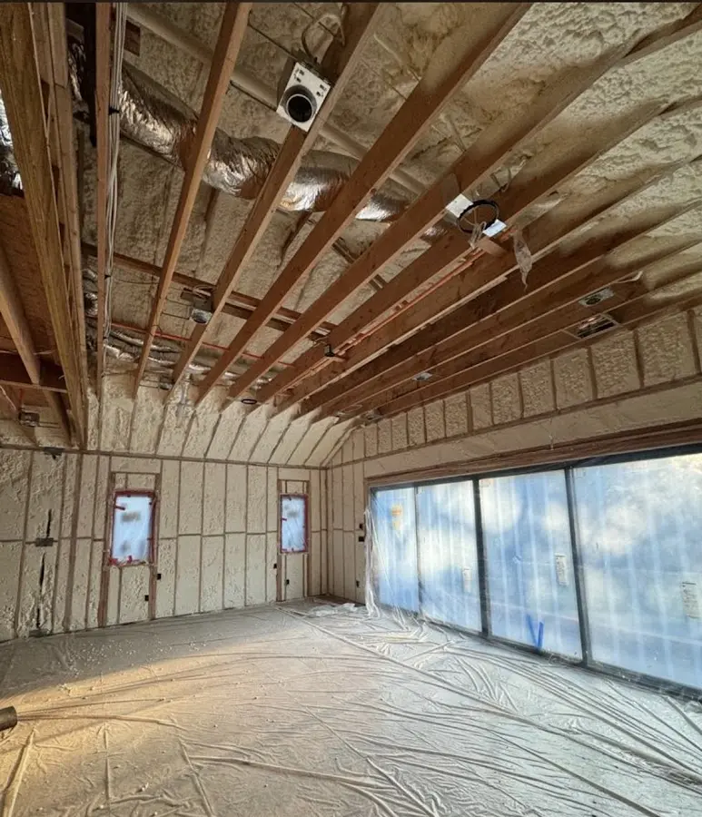 Interior walls and ceiling insulated with spray foam during new construction in San Rafael